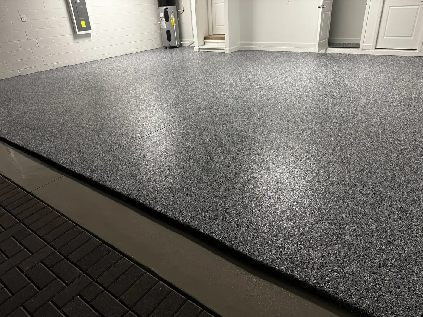 Garage floor recoated after the old coating was removed, Land O' Lakes, FL