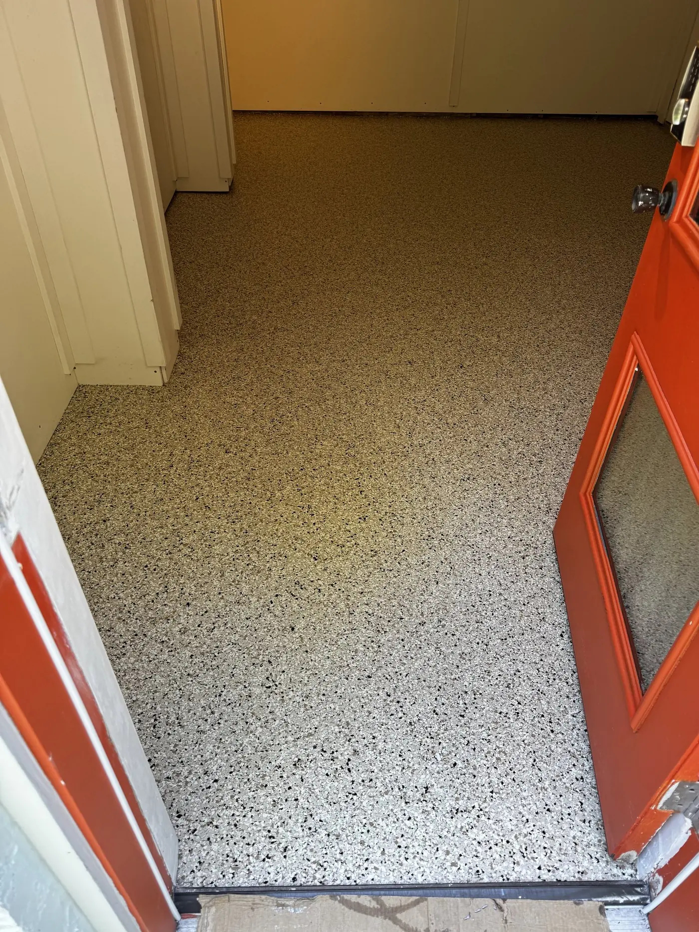 Gray flake polyaspartic garage floor in St. Petersburg, FL