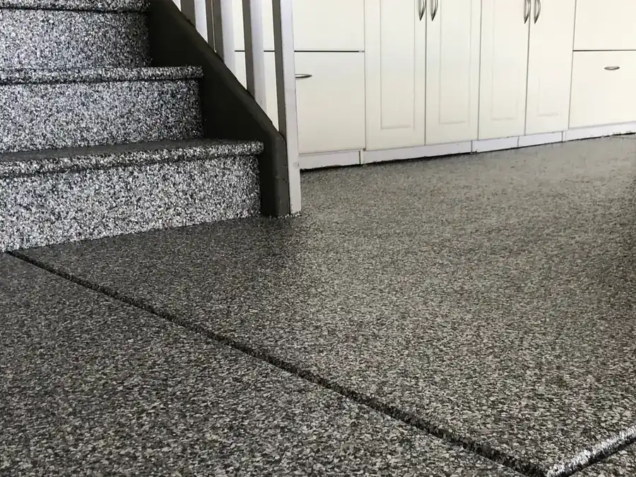 Finished garage floor with coated steps